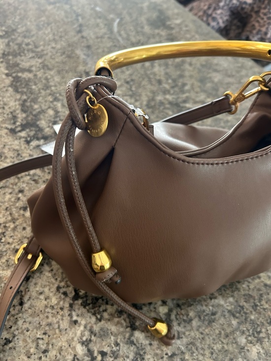 NWT BCBGeneration Chocolate Faux Leather Metal Handle Hobo
Shoulder Bag. - Picture 4 of 7